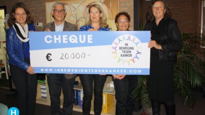 De Cirkel ontvangt cheque opbrengst In beweging tegen kanker